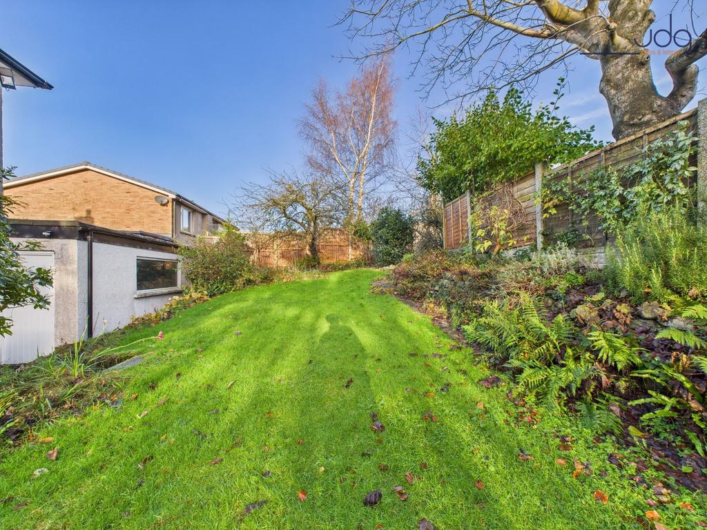 Spacious Garden with a mixture of lawn, mature...