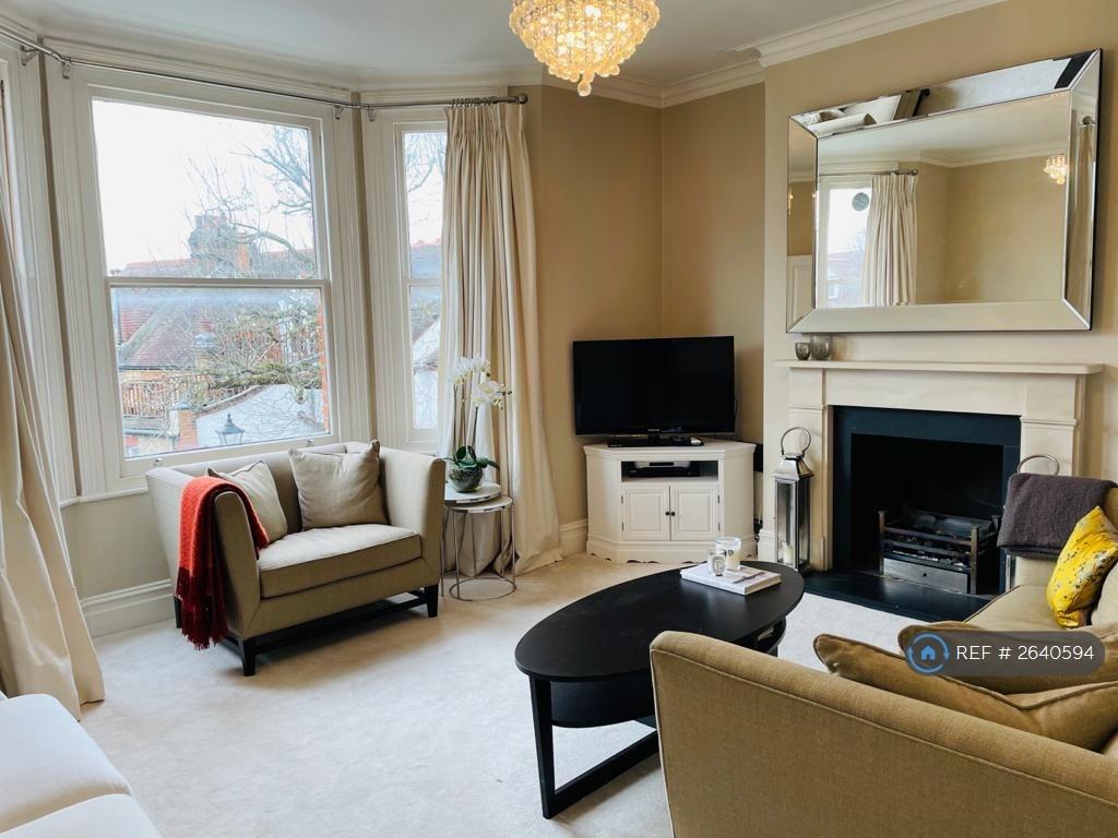 Front Room With Fireplace
