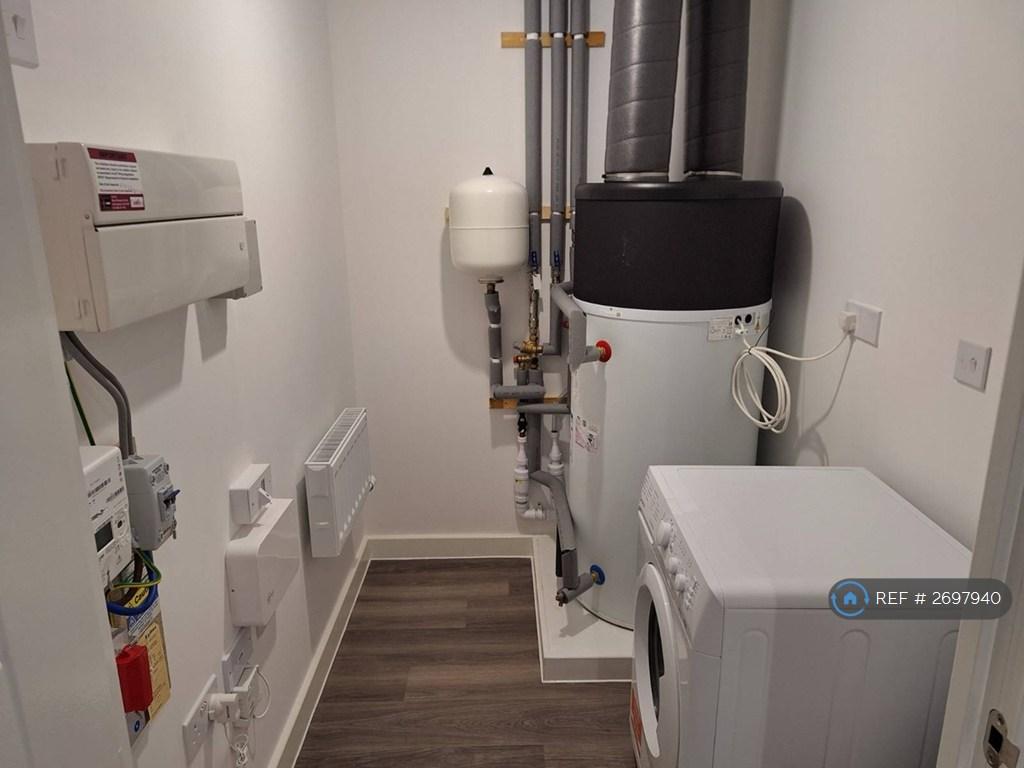 Utility Room With Washing Machine, Storage