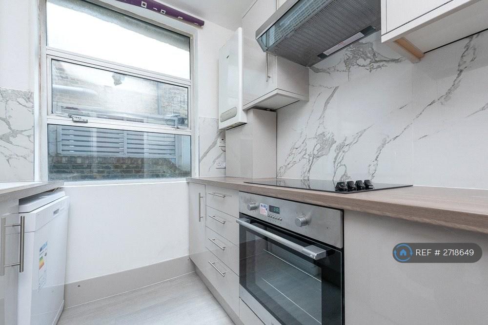 Kitchen With Vaillant Boiler, Oven And Ceramic Hob