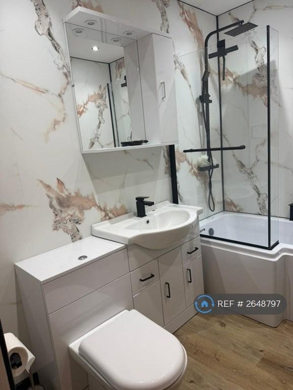 New Bathroom With Cupboard And Sink