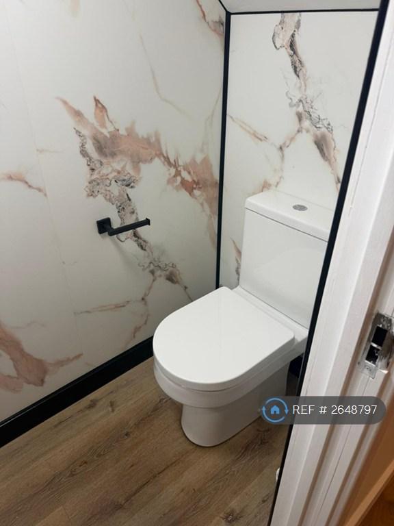 New Bathroom With Toilet To The Left