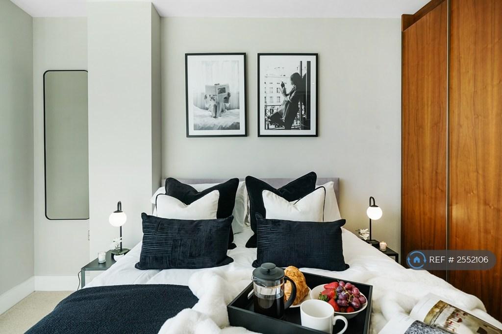 The Elegant Bedroom With a Kingsize Bed