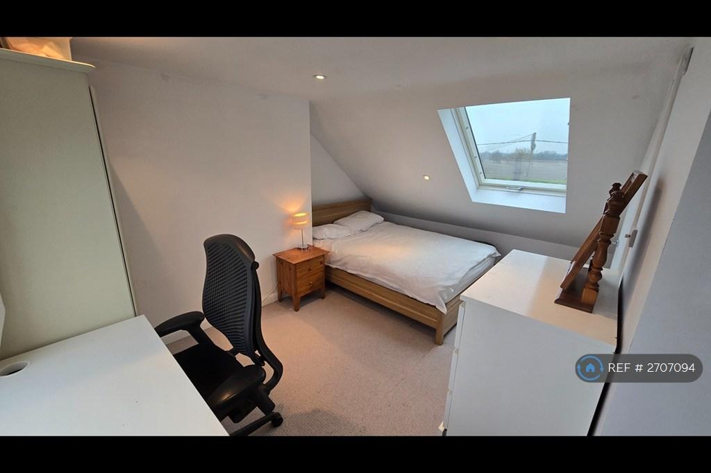 Large Loft Bedroom With Bedside Table And Drawers