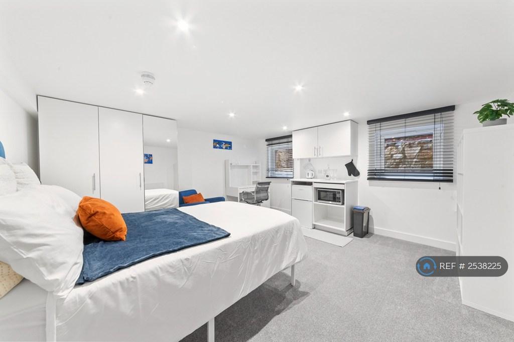 Basement Bedroom With Tea Station