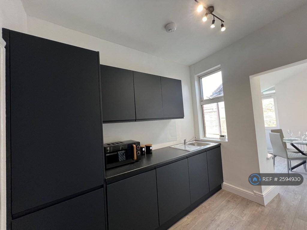 Kitchen Opening Into Dining Room