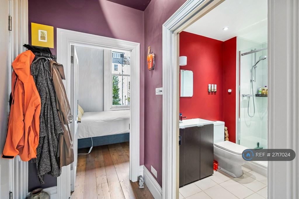 Entrance Hallway To Bathroom And Bedroom
