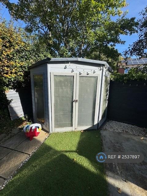 Storage Unit In Back Garden