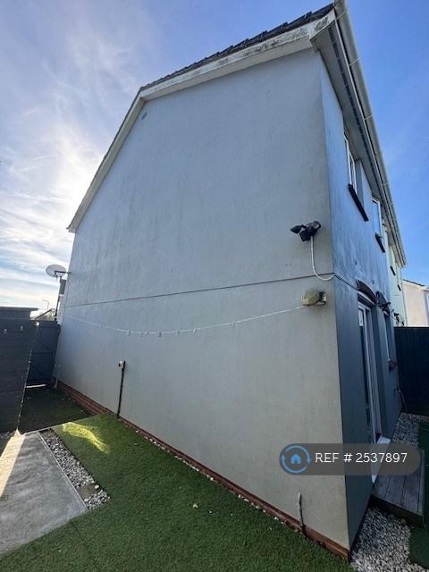 Side Wall To House In Back Garden