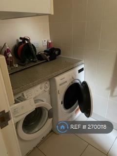 Utility Room Was Mach And Dryer