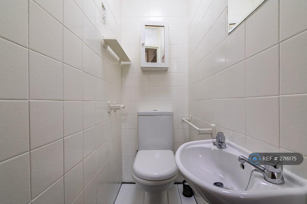 Toilet/Sink Next To Bedroom
