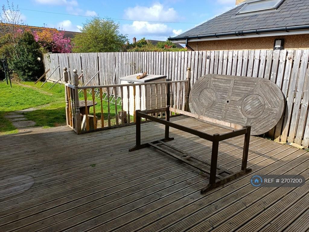 Decking With Large Outdoor Table