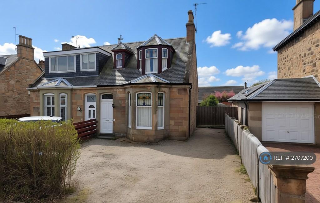 Front Of House And Gravel Drive