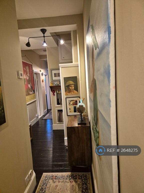 Welcoming Hallway With Character Decor