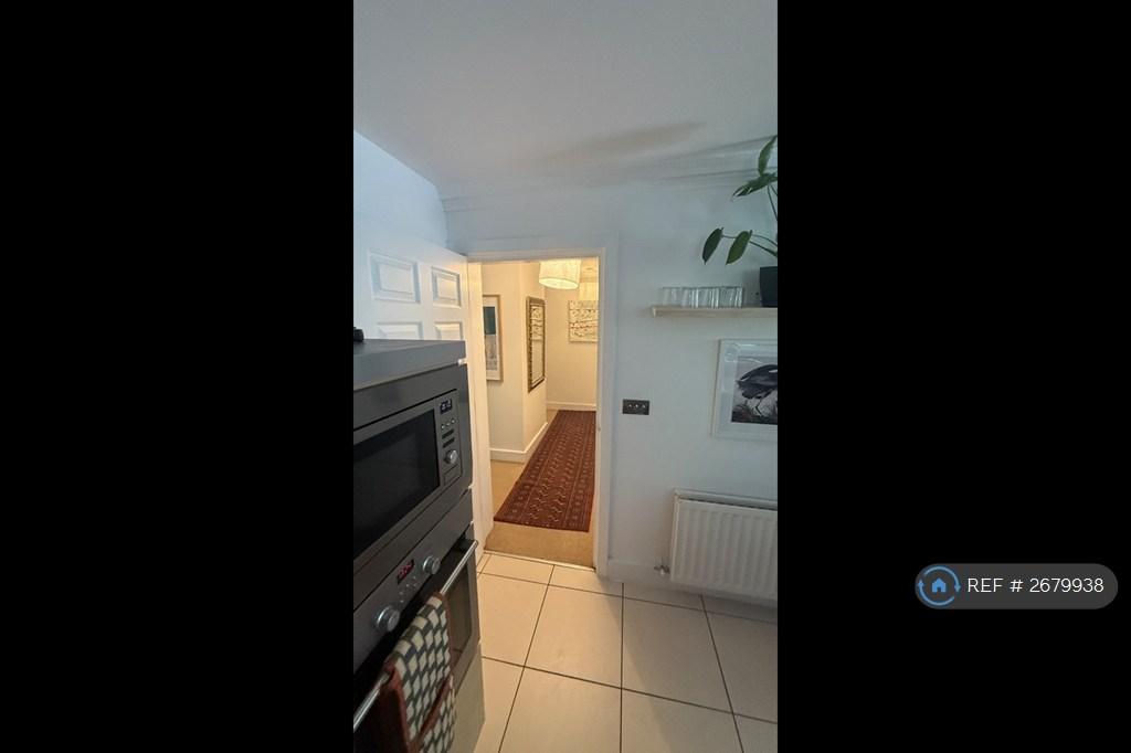 Hallway From Kitchen To Bedrooms And Entrance
