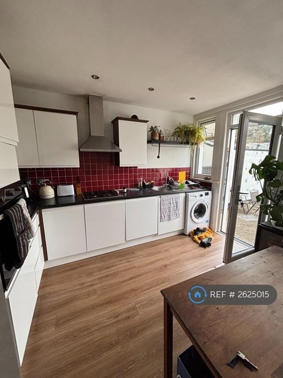 Modern Kitchen Opening To The Garden