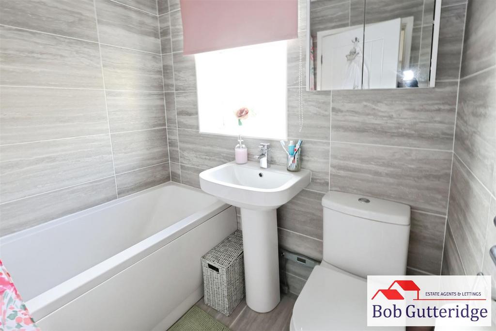 Luxury fully tiled bathroom