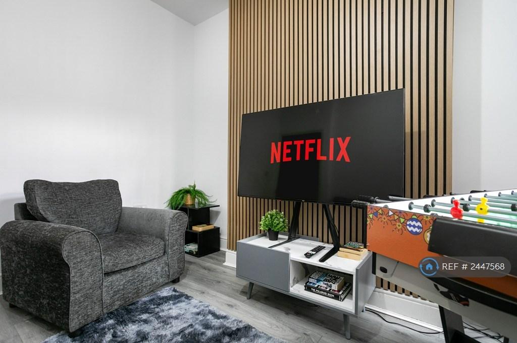 Living Room With Multi-Games Table