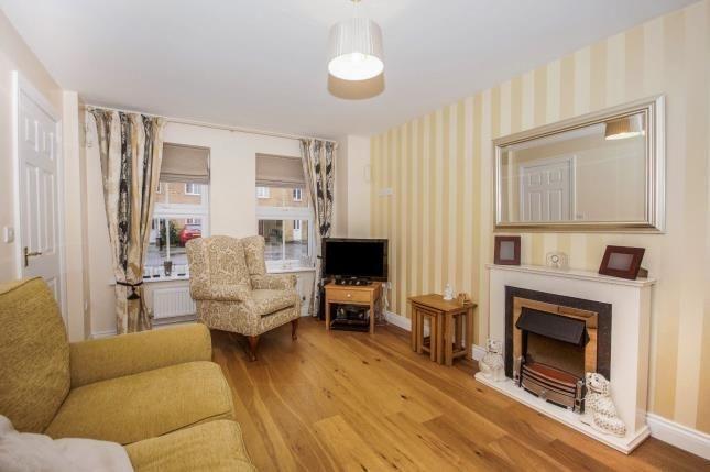 Bright, neatly presented living room with wood ...