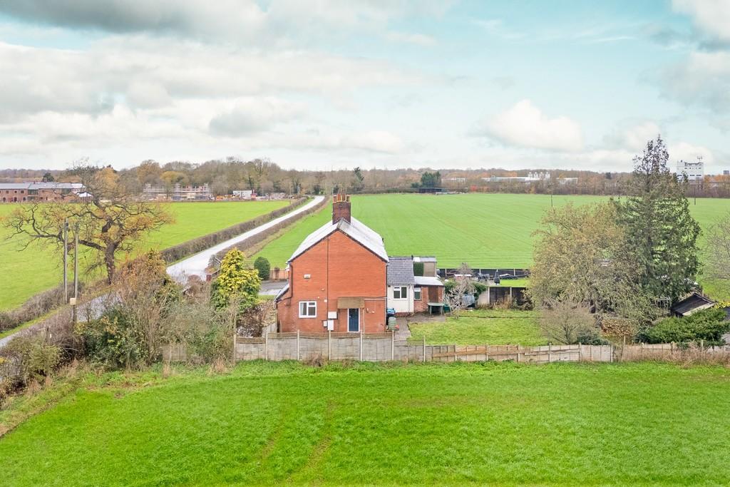 Barn Conversions to the left.