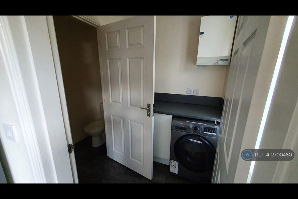 Utility Room + Toilet
