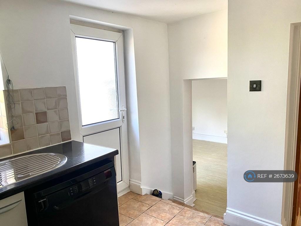 Kitchen & Door To Garden
