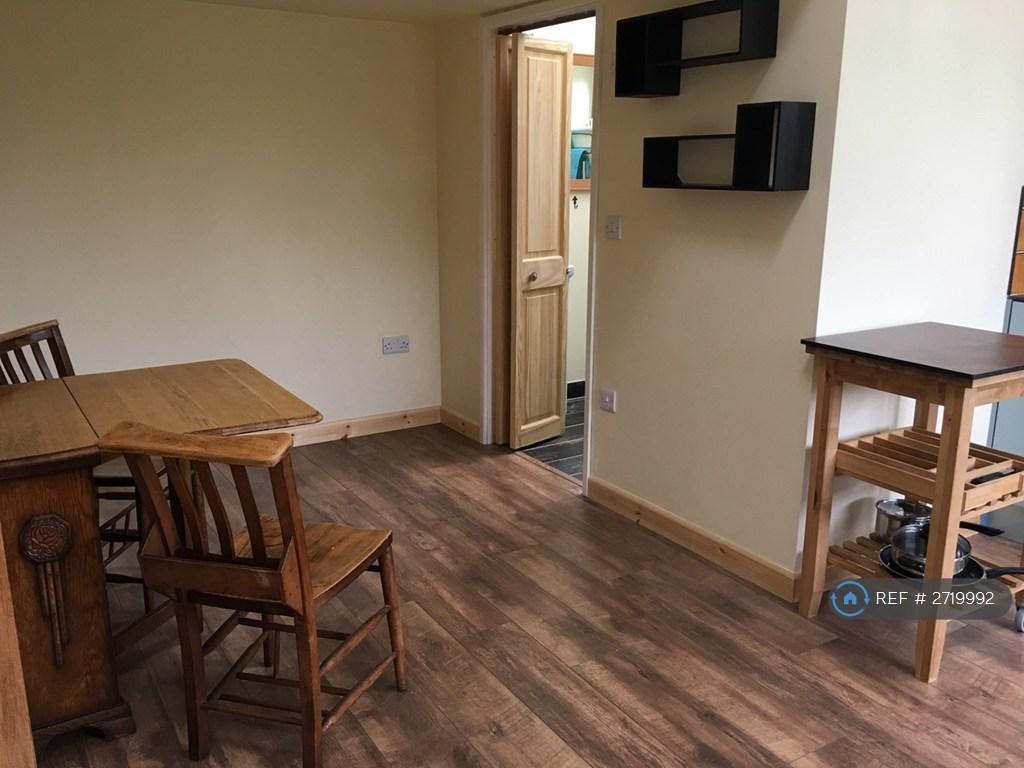 Dining/Workspace Showing Bathroom Door