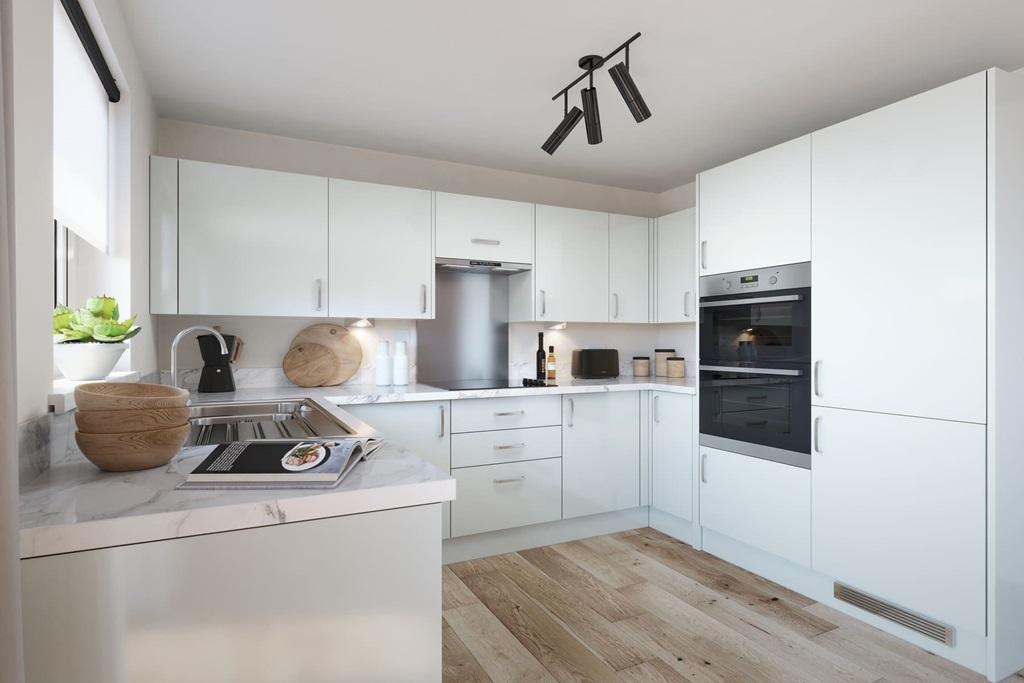 Modern three-sided kitchen with ample storage...