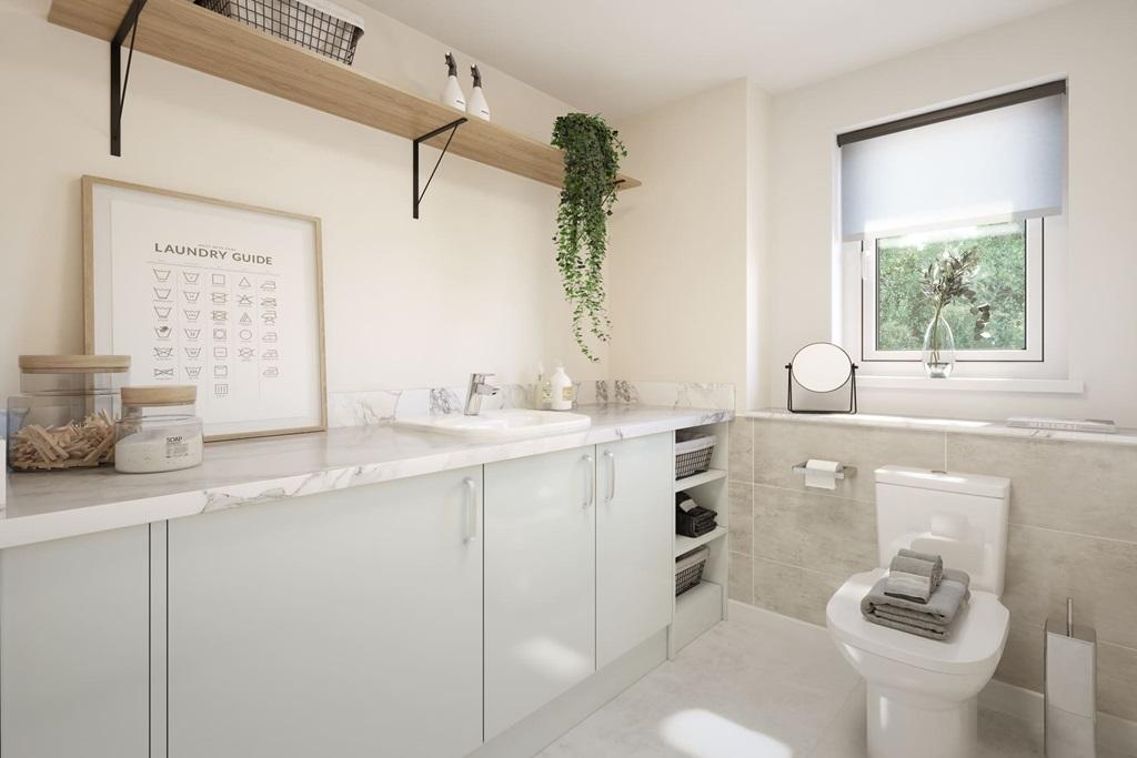 Combined cloakroom/utility is ideal for laundry