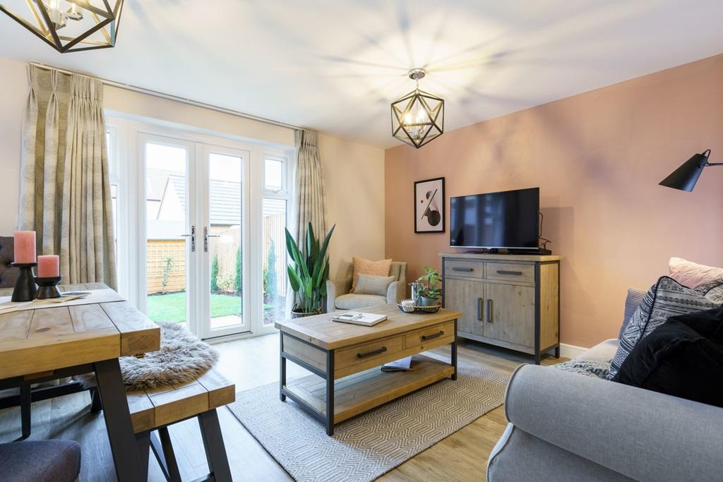 Double doors lead from a spacious lounge to the...