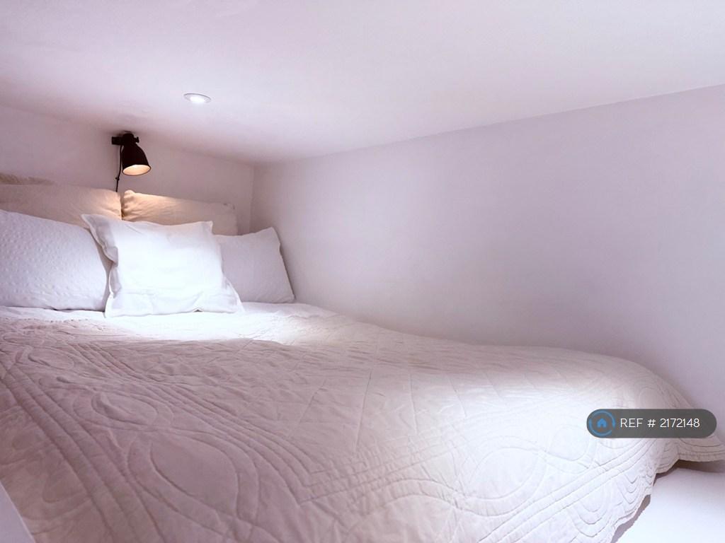 The Comfy Double Bed In The Low Ceiling Mezzanine