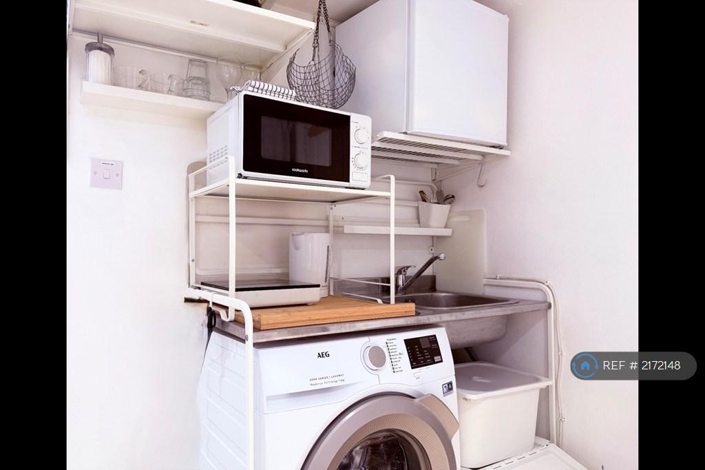 The Washing Machine And Kitchenette
