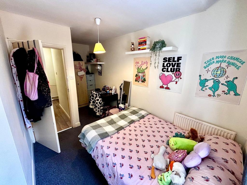A cozy and well-decorated living space with liv...