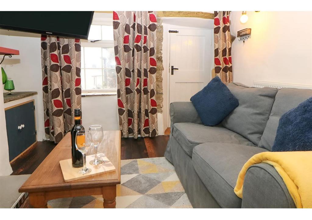 Living room with front door.jpg