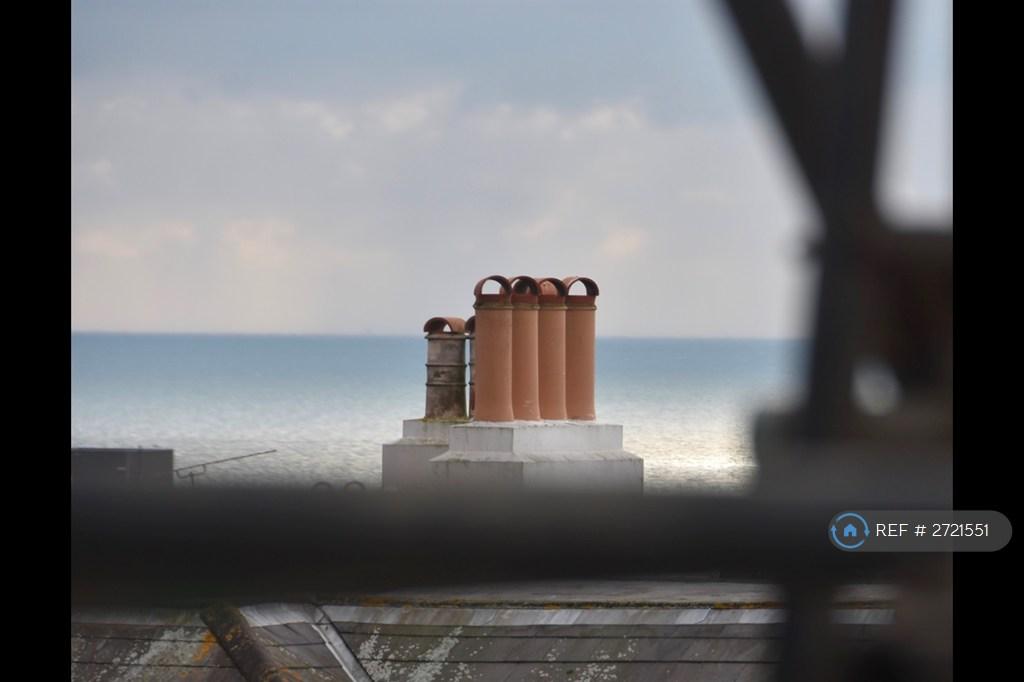 Sea View Over The Roof Tops