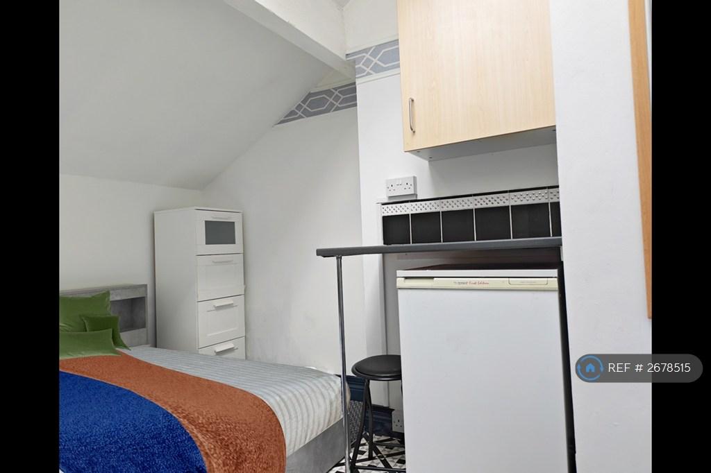 Bedroom With Fridge, Worktop & Cupboard