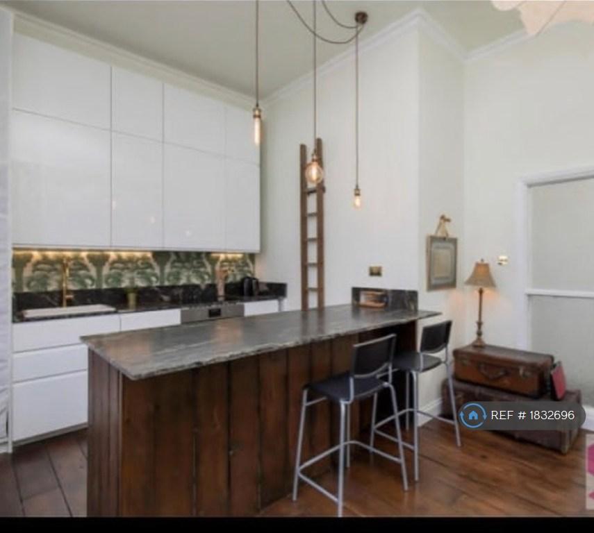 Kitchen Showing Breakfast Bar