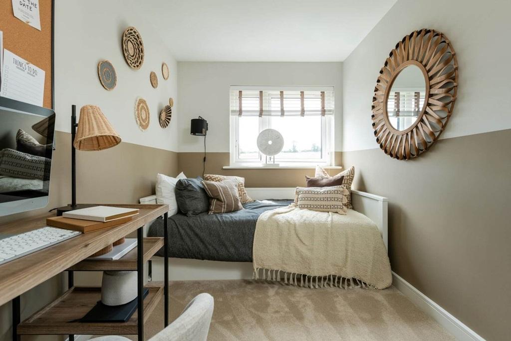 The third bedroom is well-suited to a child or...