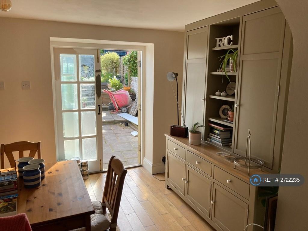 Dining Room.  French Windows And Built In Dresser.