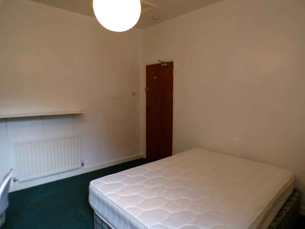 Simple furnished bedroom with a double mattress...