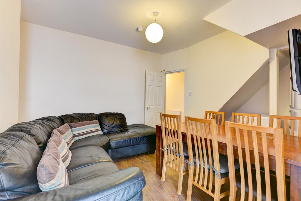 Bright furnished living and dining area featuri...