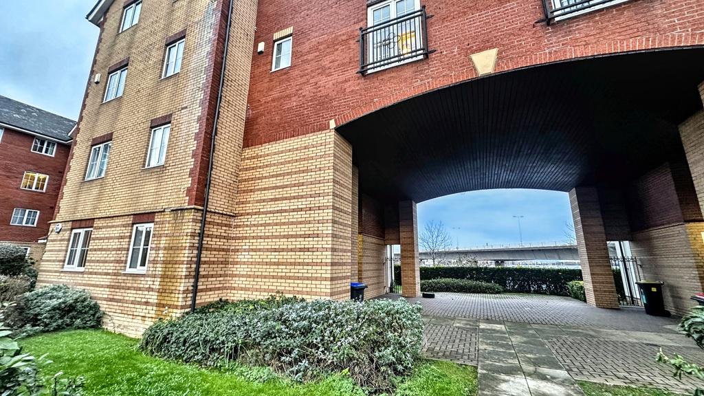 Modern brick-and-render apartment building with...