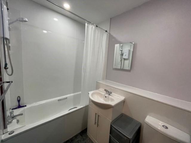 Bathroom With Electric Shower