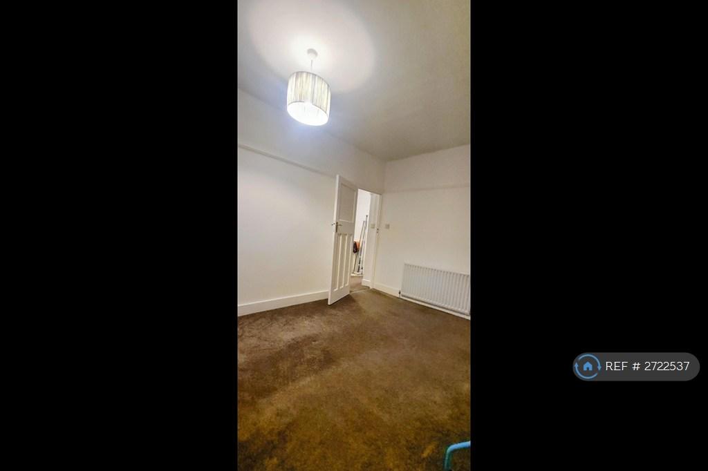 Room 2. Back Bedroom.