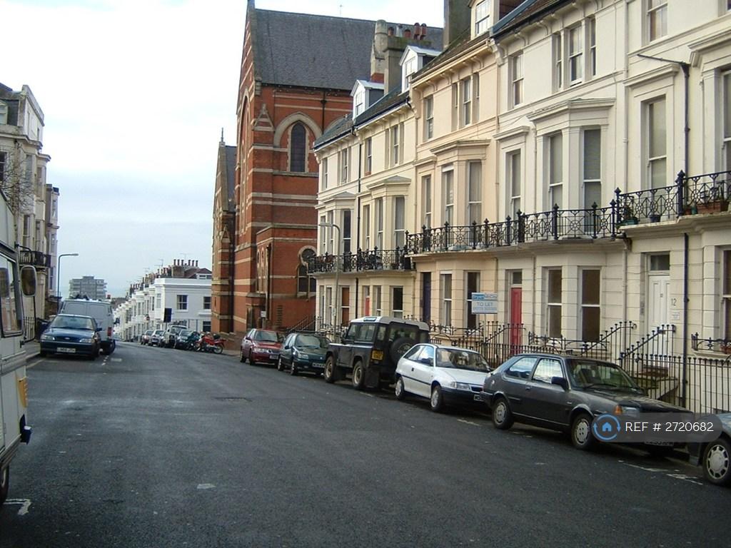 View Down The Street With Sea In Distance