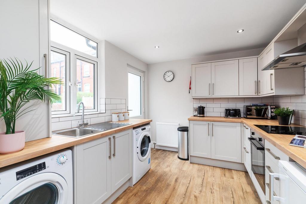 Bright, modern kitchen with light shaker-style ...