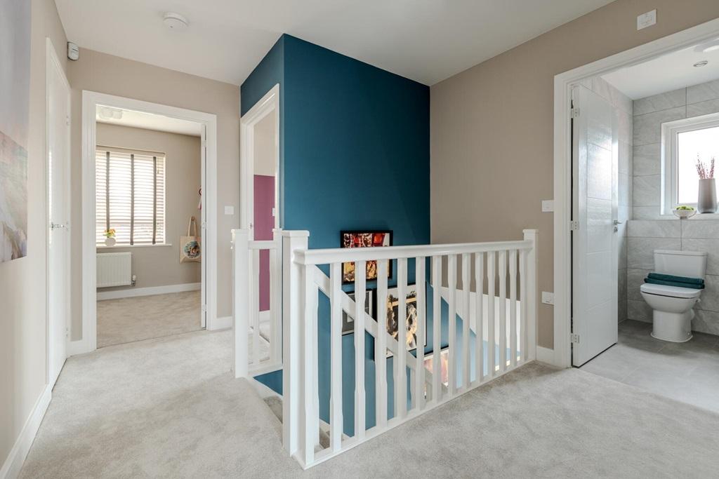 Very spacious landing with storage cupboard