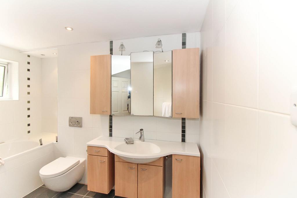 Ensuite shower room to lower ground floor bedroom