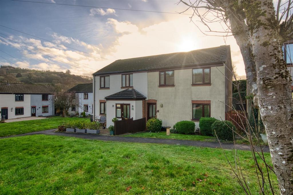 Front of the home and sunburst.jpg