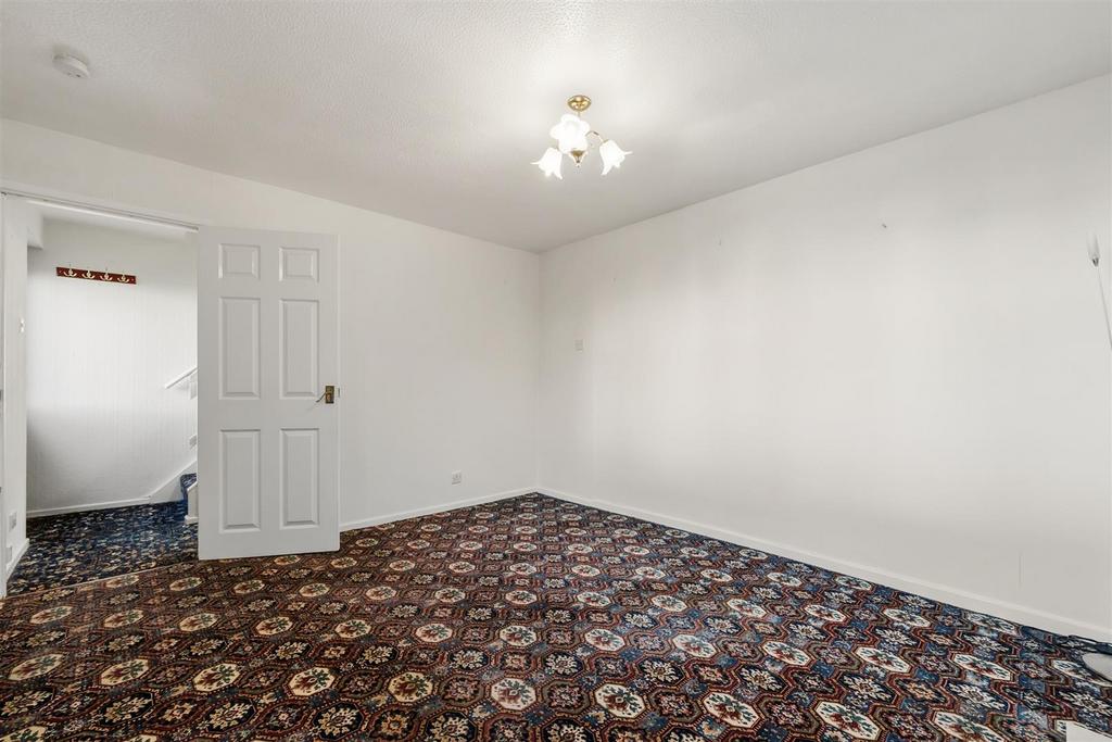 Sitting Room to entrance hallway.jpg